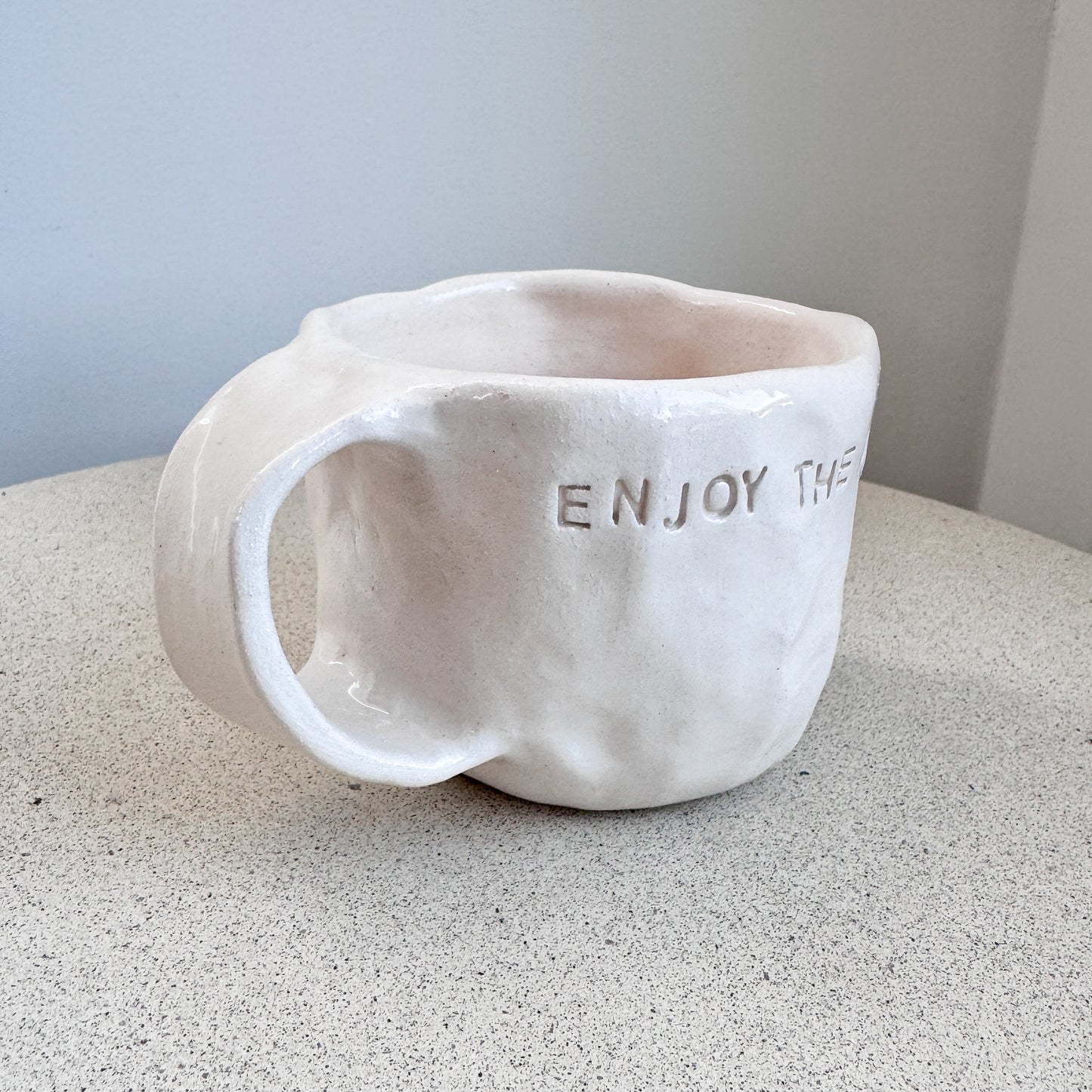 “ENJOY THE MOMENT” Text Mug (Handshaped)